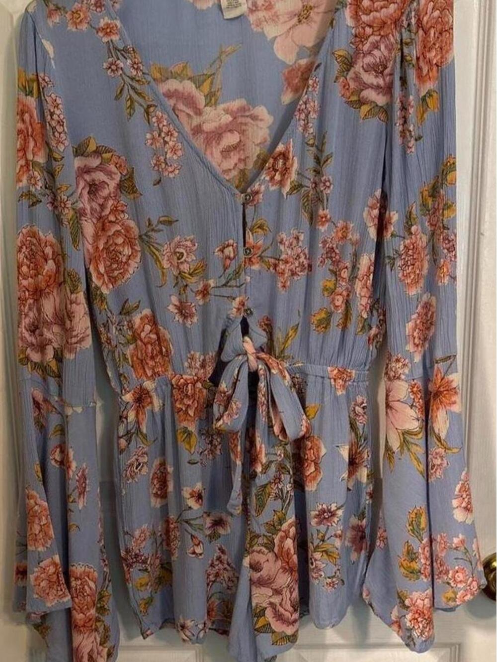 Billabong blue floral romper with tie waist and peekaboo